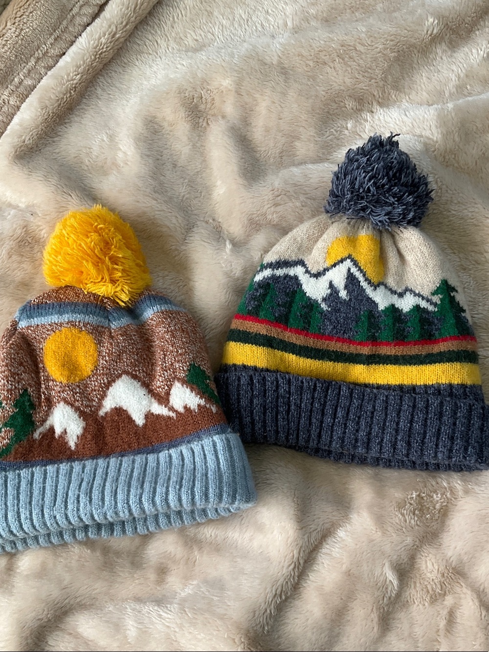 2 toddler winter hats - fits to about 2T
Kids Mountain Knit Pom Hat fleece lined